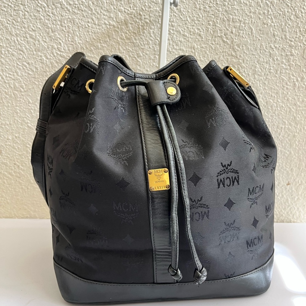 MCM Black Bucket Bag with Gold Accents
